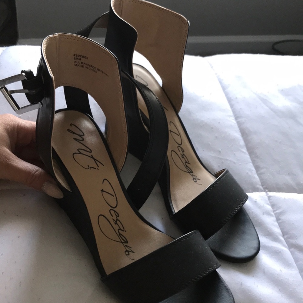 Wedged heels. NEVER WORN $25